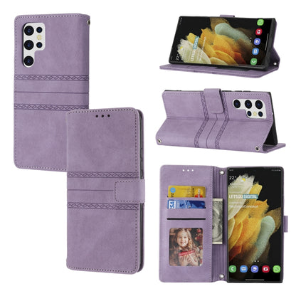 Lavender leather flip phone case with magnetic buckle and card pockets, phone in holder