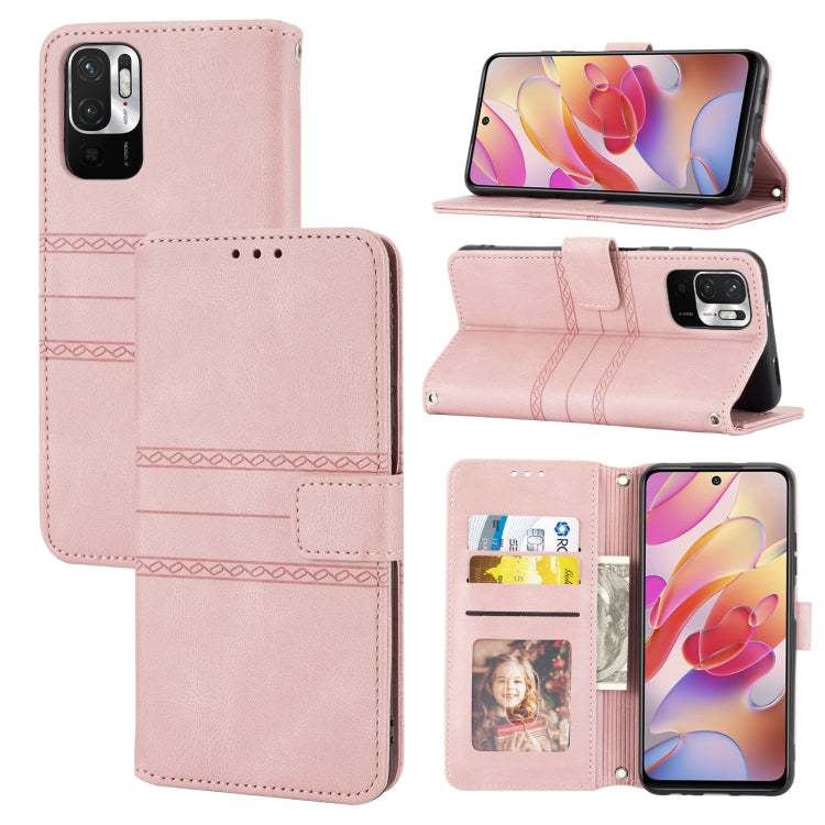 Pink leather flip phone case with embossed stripes, card slots, and camera cutout