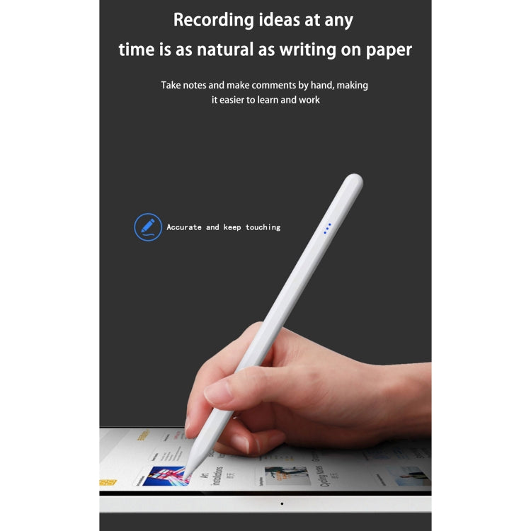 Universal active capacitive stylus pen writing on paper, light gray body and fine tip.
