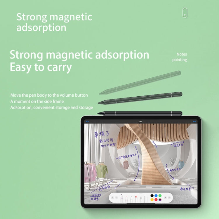 Two magnetic stylus pens with disc tips and a tablet showing screen