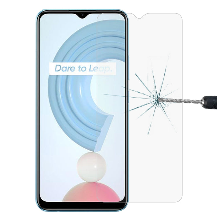 Tempered glass screen protector on phone screen, impact crack visible on film