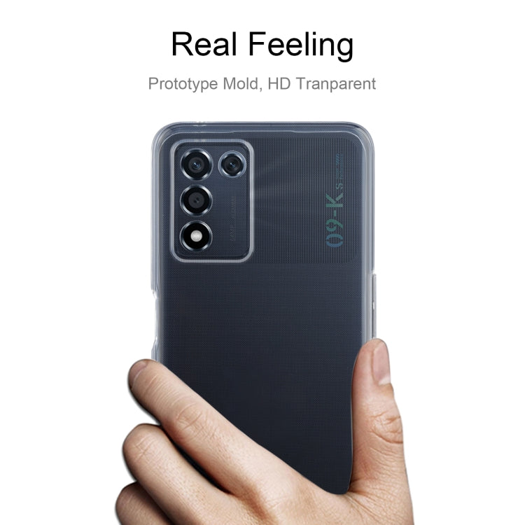 Clear TPU phone case held in hand, showing camera cutout and slim fit