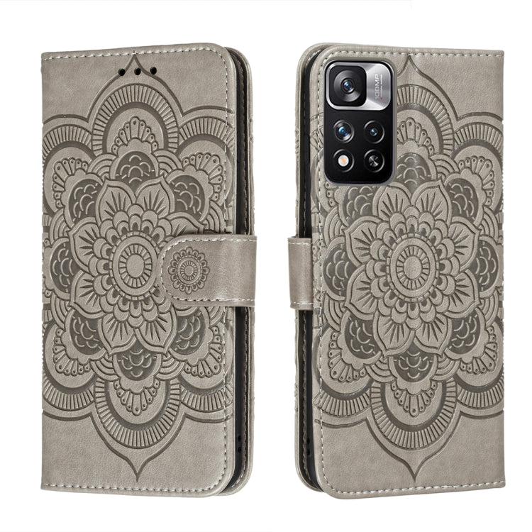 Grey embossed mandala phone wallet case with magnetic strap and lens opening