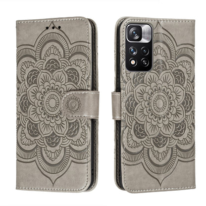 Grey embossed mandala phone wallet case with magnetic strap and lens opening
