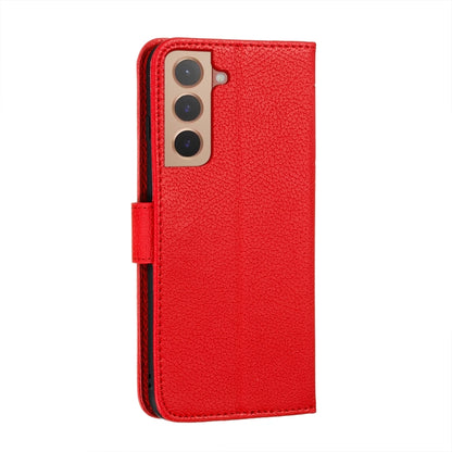 Red leather phone wallet case with camera cutout and flip strap