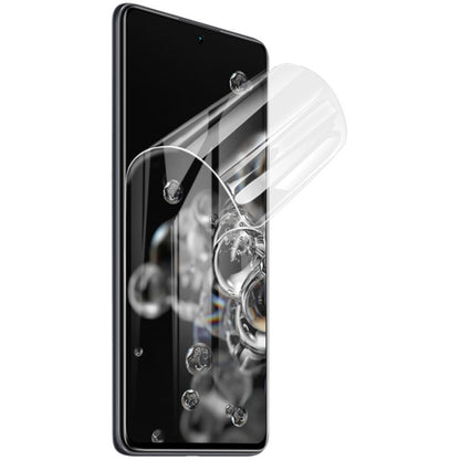 Curved hydrogel screen protector film on black smartphone display