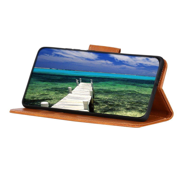 Brown leather flip phone case with stand function, holding a phone displaying a landscape