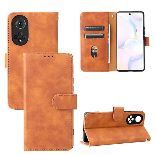 Brown PU leather flip phone case with magnetic closure, card slots, and stand pocket