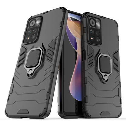 Black shockproof phone case with magnetic ring holder and raised camera protection