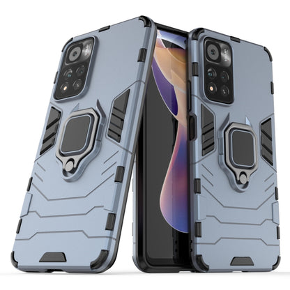 Navy blue rugged phone case with magnetic ring holder and camera cutouts
