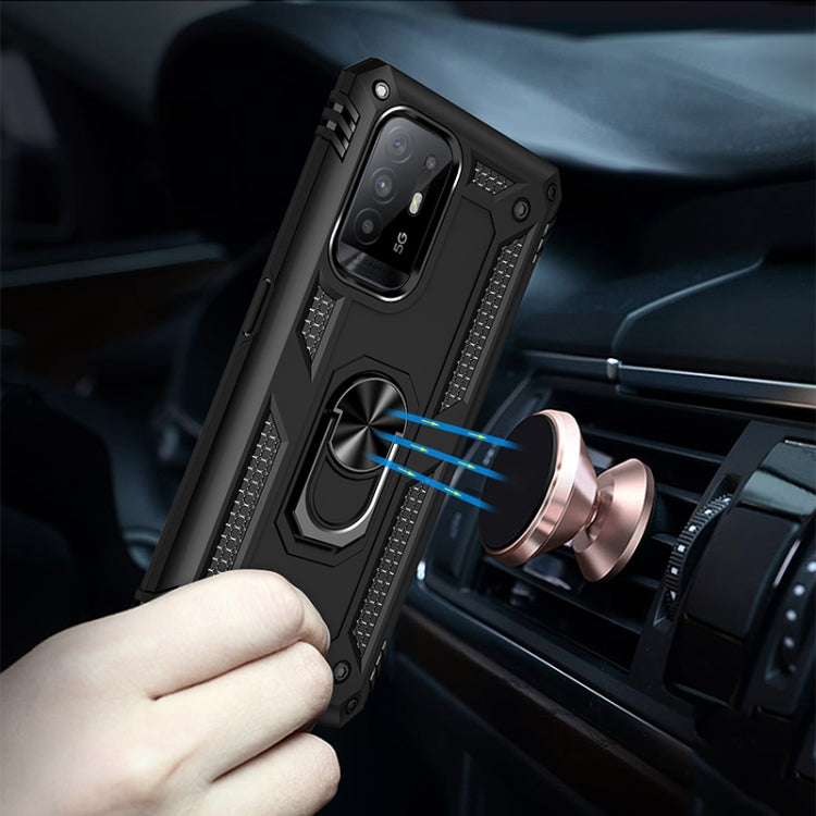 Black rugged phone case with metal ring stand mounted in a car air vent
