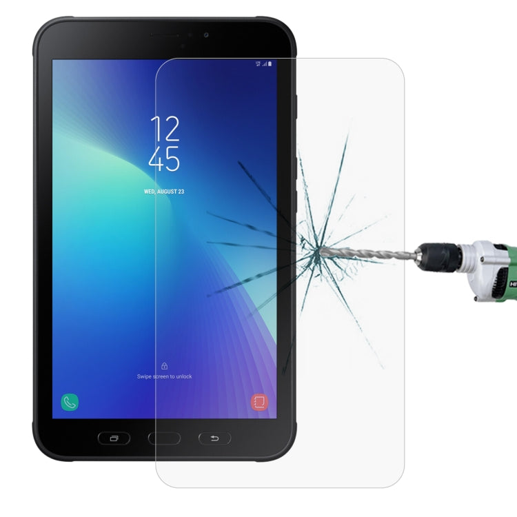 Tempered tablet screen protector film on a black tablet screen with impact crack lines