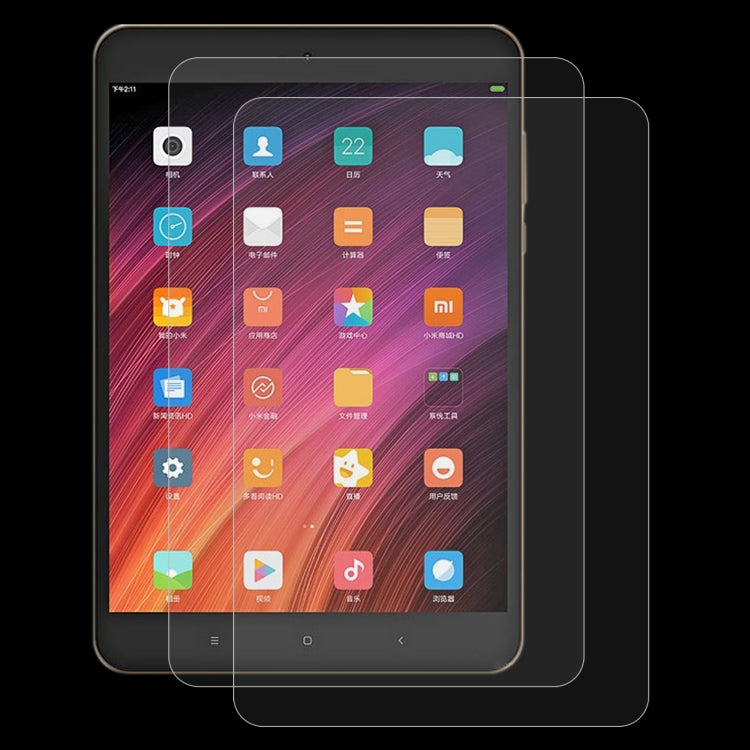 Clear tempered glass screen protector film applied to a tablet touchscreen with rounded edges.