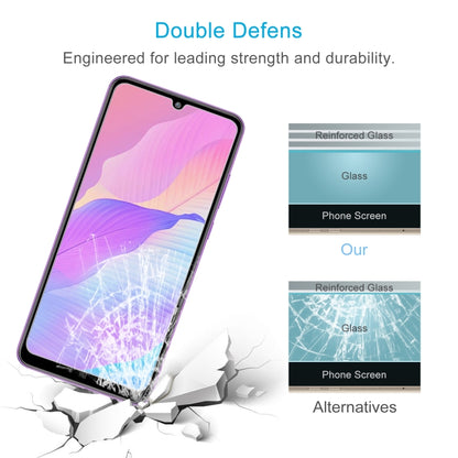 Smartphone tempered glass screen protector film laid over phone, showing impact-resistance