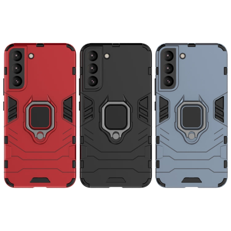 Set of rugged phone cases with magnetic ring stands in red, black, and light blue