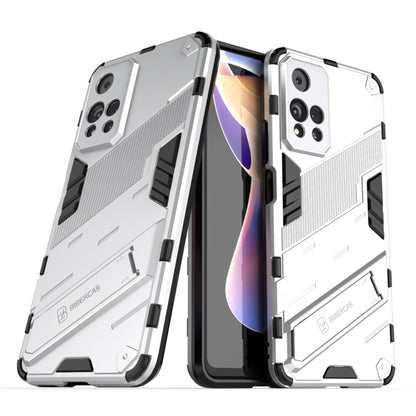 Shockproof armored phone case with built-in holder, white rugged armor with black accents