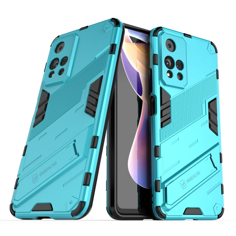 Turquoise shockproof phone case with raised armor edges and black strap detail