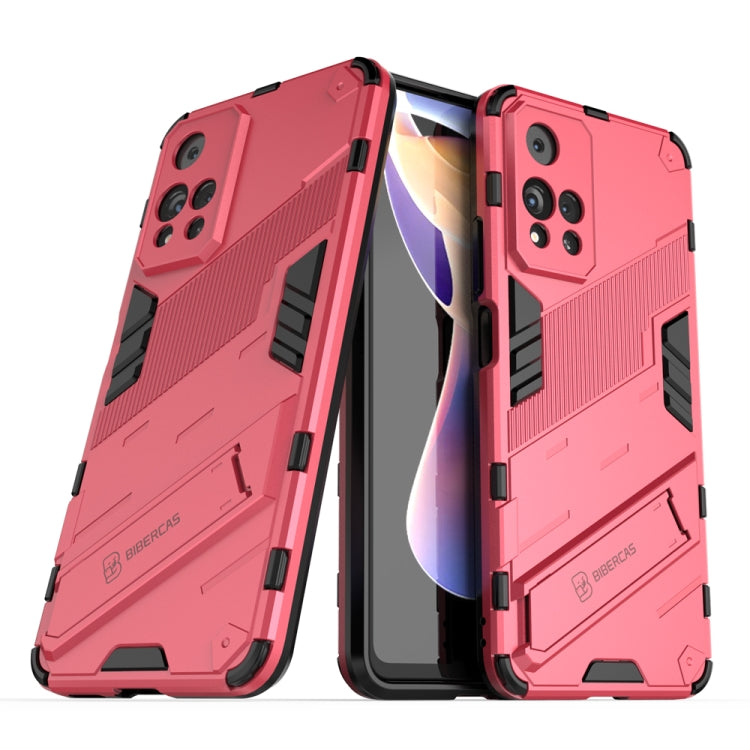 Red shockproof phone case with raised armor edges and black strap detail