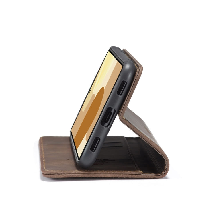 Brown leather flip phone case with kickstand, propped open at an angle