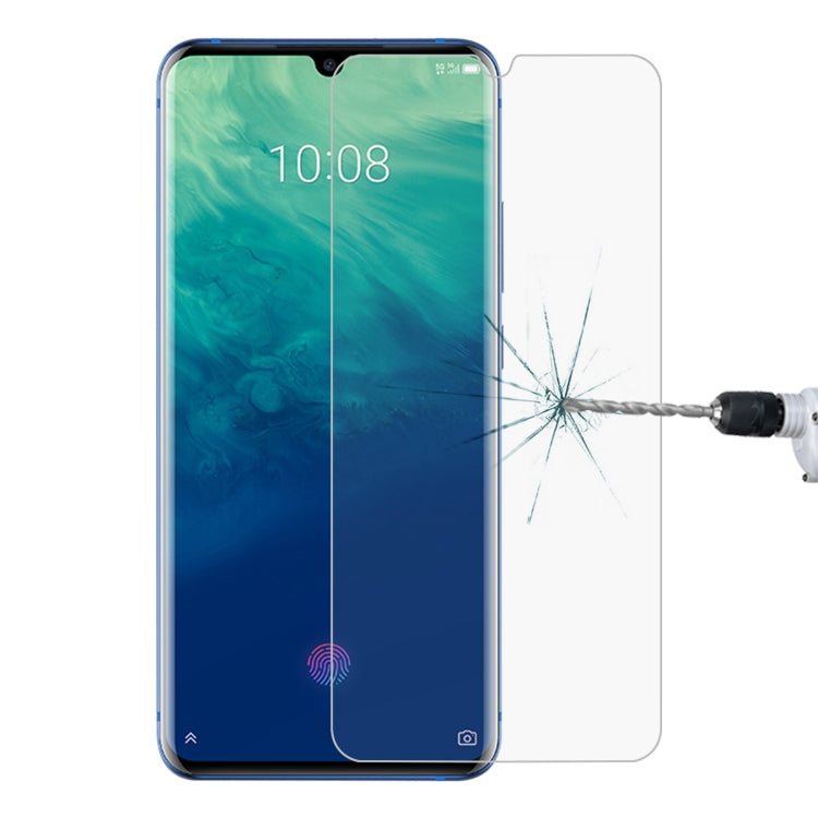 Tempered glass screen protector fitted on smartphone display, impact damage shown