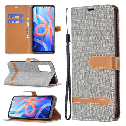 Denim-texture phone wallet case with lanyard, card slots, and stand flap, grey color