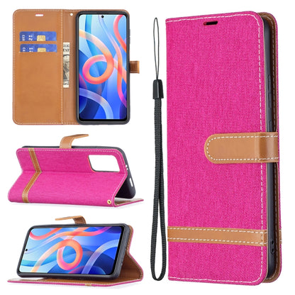Pink denim-texture phone wallet case with lanyard, card slots, and stand flap