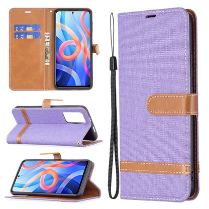 Purple denim-texture phone wallet case with lanyard, card slots, and stand flap