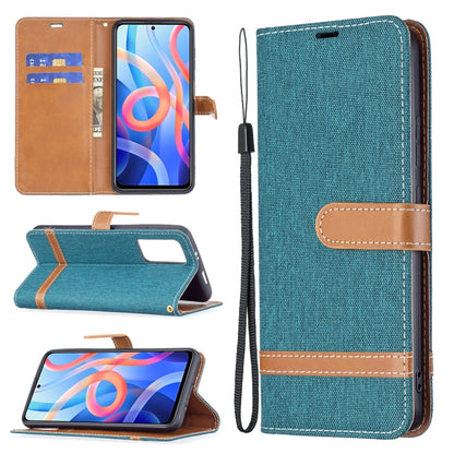 Denim-texture phone wallet case with teal fabric, tan trim, card slots, and lanyard