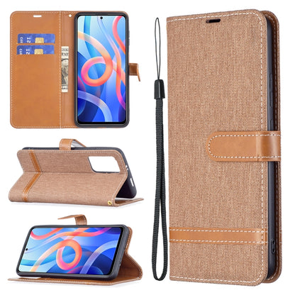 Denim-texture phone wallet case with rose fabric, tan trim, card slots, and lanyard
