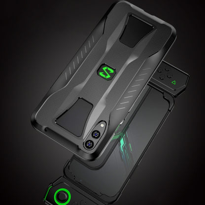 Grey phone case with textured grip panels, camera openings, and green logo accents