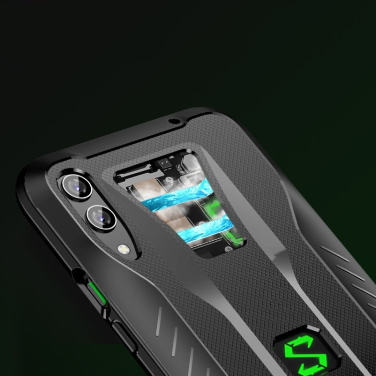 Light grey TPU phone case with cutout window and camera openings, green accent logo
