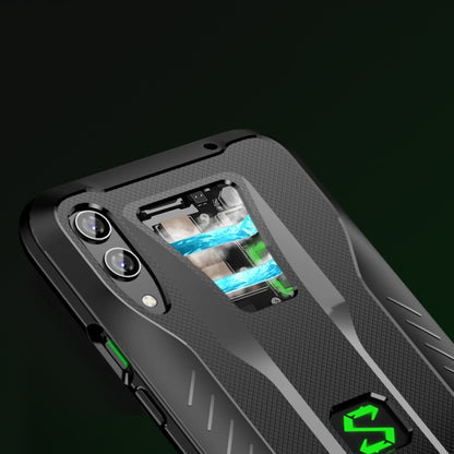 Light grey TPU phone case with cutout window and camera openings, green accent logo