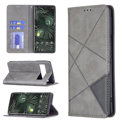 Grey leather magnetic flip phone case with card slots and fold-out stand