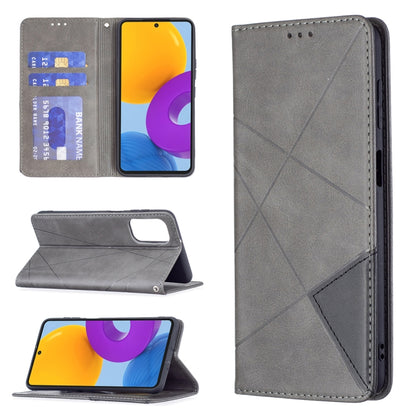 Grey leather magnetic flip phone case with card slots and fold-out stand