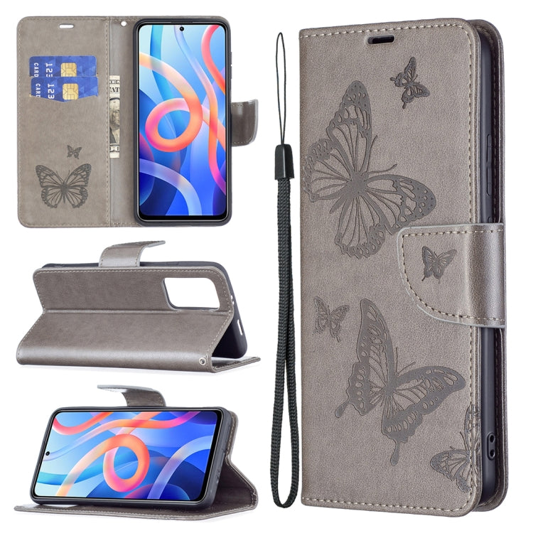 Grey leather phone case with embossed butterflies, card slots, lanyard cord, and wallet cover.