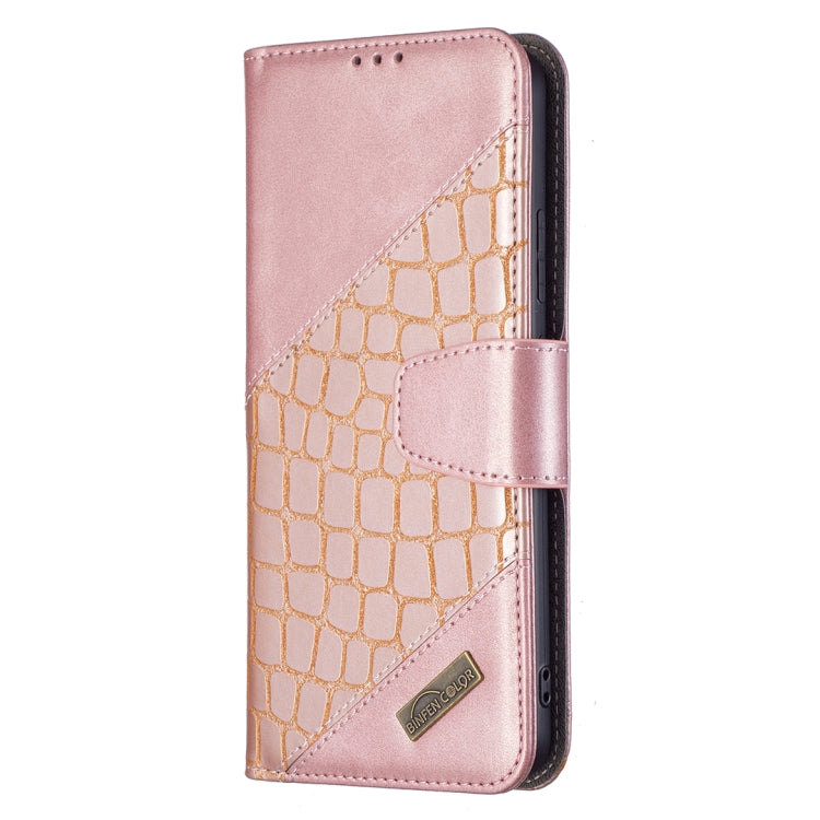 Rose gold leather-look flip phone case with gold-tone crocodile texture and card holder