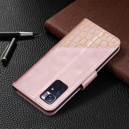 Rose gold flip phone case with gold crocodile texture and camera cutout