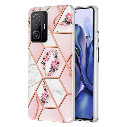 Pink floral marble TPU phone case with hexagon pattern, clear edges, camera cutouts
