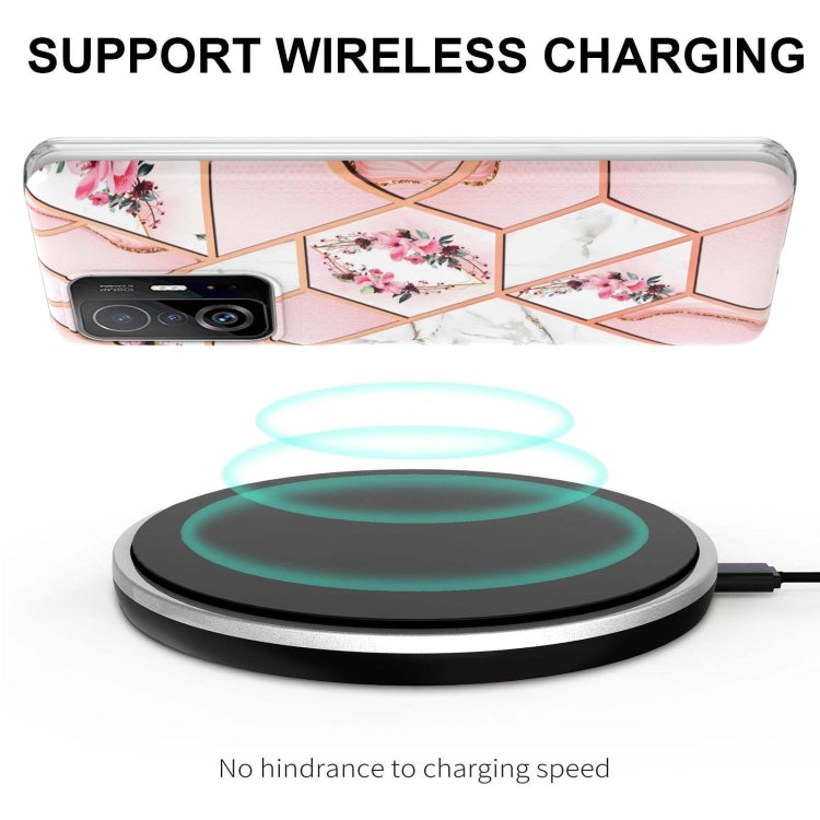 Pink floral hexagon TPU phone case with wireless charging compatibility, clear protective edges