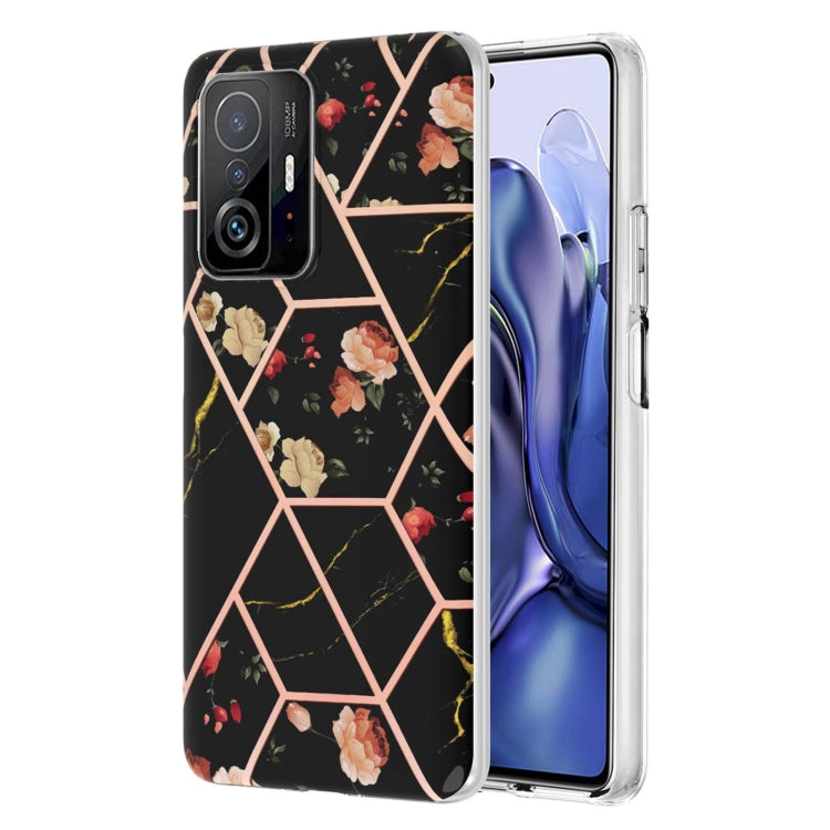 Black floral marble TPU phone case with hexagon pattern, clear edges, camera cutouts