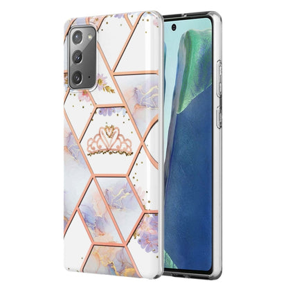 White TPU phone case with peach marble-style hexagon pattern and flower accents
