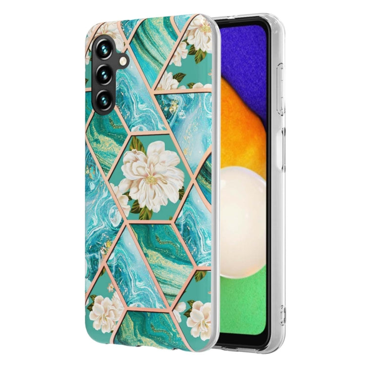 Teal TPU phone case with marble-style hexagon design and cream flower details