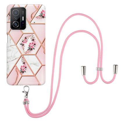 Pink floral TPU phone case with hex marble design and pink lanyard