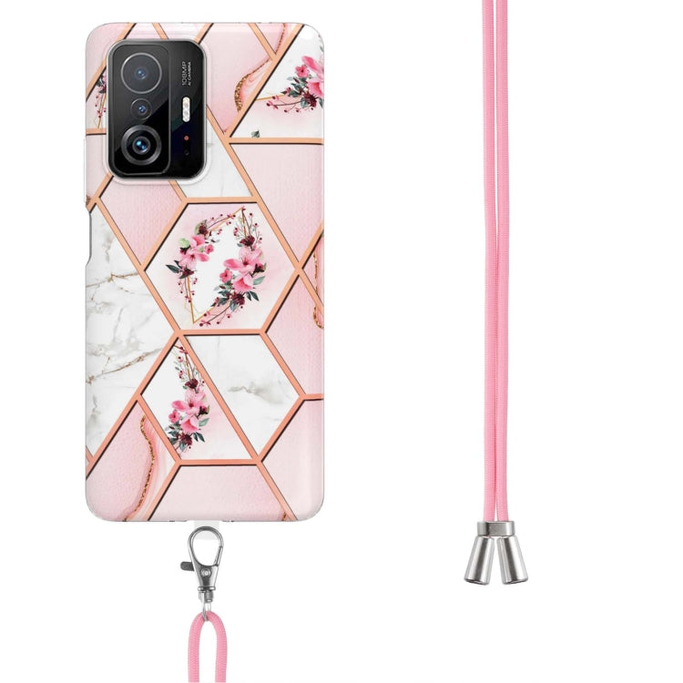 Pink floral TPU phone case with hex marble pattern and pink lanyard strap