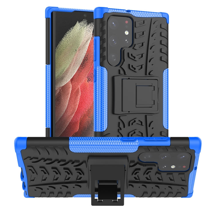 Tire-textured phone case with built-in holder, blue and black