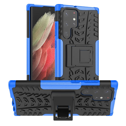 Tire-textured phone case with built-in holder, blue and black