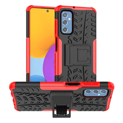 Tire-textured phone case with built-in holder, red and black