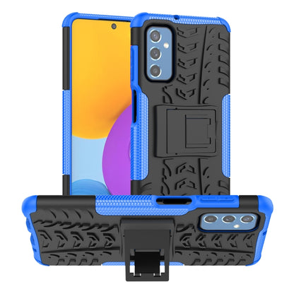 Tire-textured phone case with built-in holder, blue and black