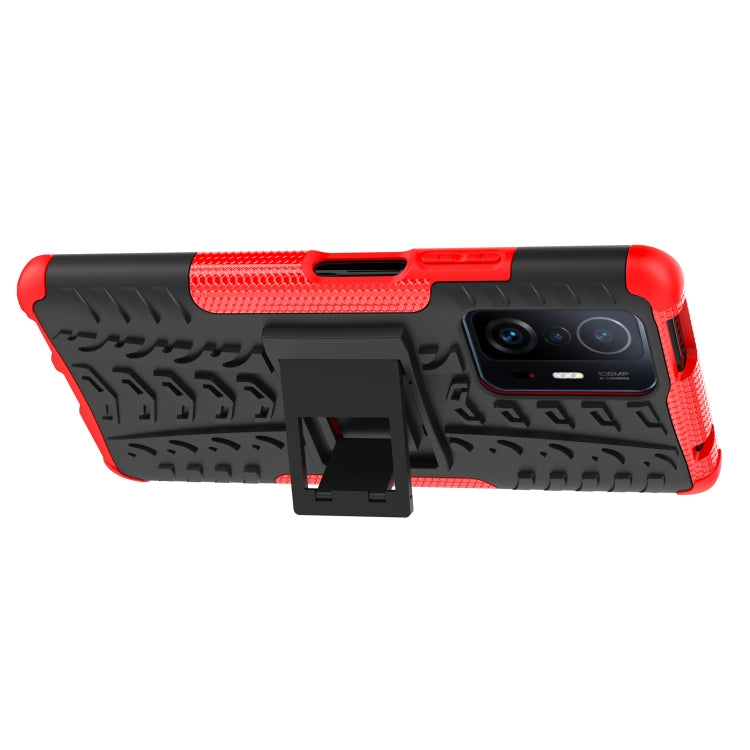 Rugged red and black tire-texture phone case with kickstand/holder attachment