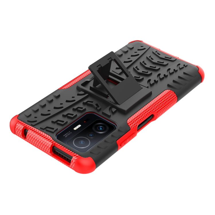 Red and black textured phone case with built-in holder, raised camera bump, grippy sides